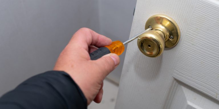 How to unlock bathroom door with hole