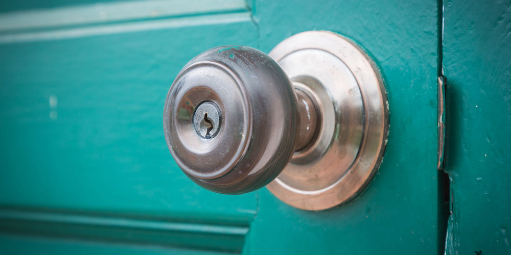 how to unlock bathroom door with hole on side